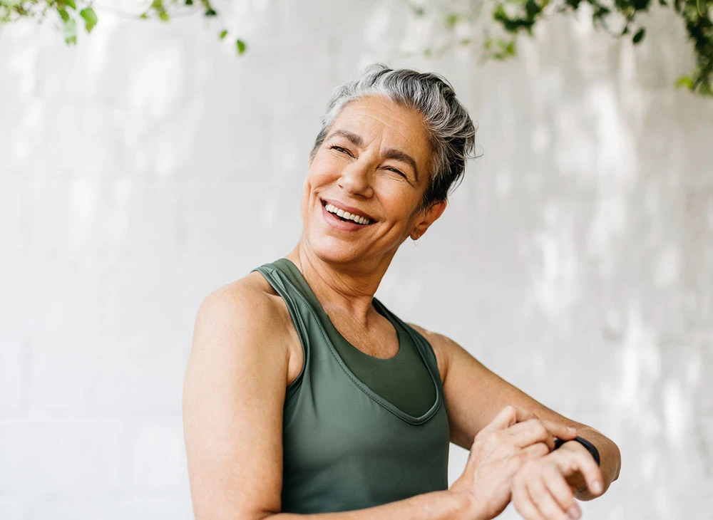 woman smiling before exercise | Las Vegas Surgical Associates