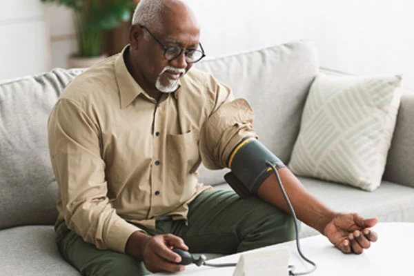 man checking his blood pressure Las Vegas, NV | LVSA