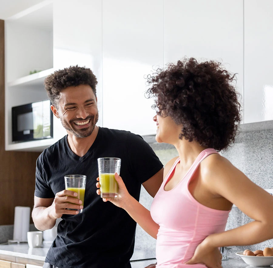 man and woman drinking green juice | Las Vegas Surgical Associates